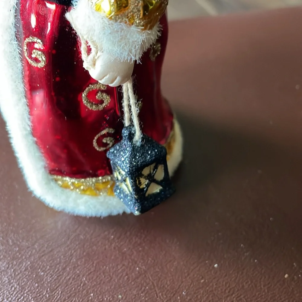 VTG Handblown Santa ornament holding a bottle brush Christmas tree and lantern